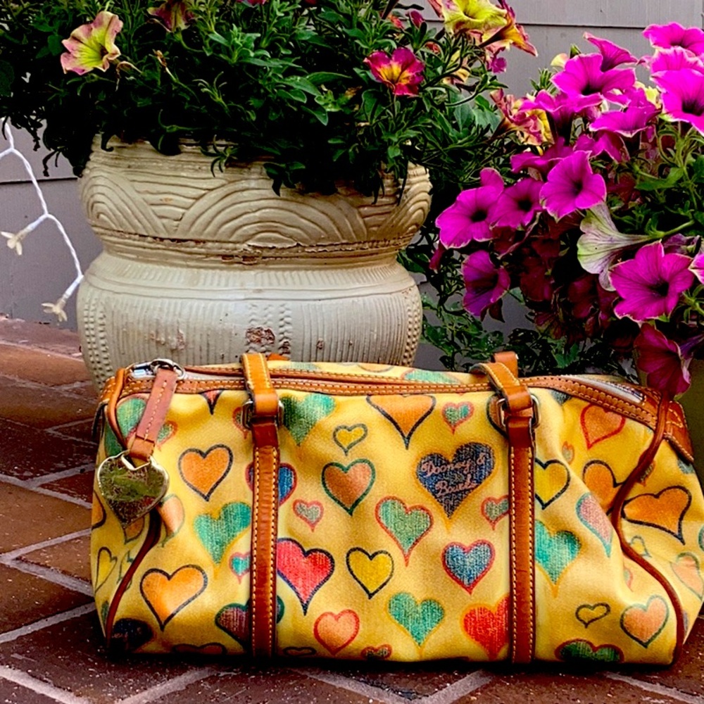 Dooney & Bourke medium handbag with handles. Adorable and very chic!